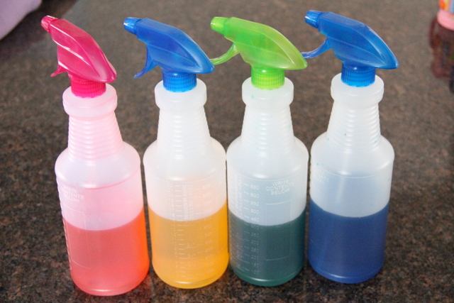 Paint snow with spray bottles