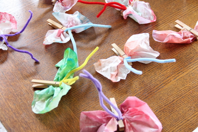 Coffee filter butterfly craft for building fine motor skills.
