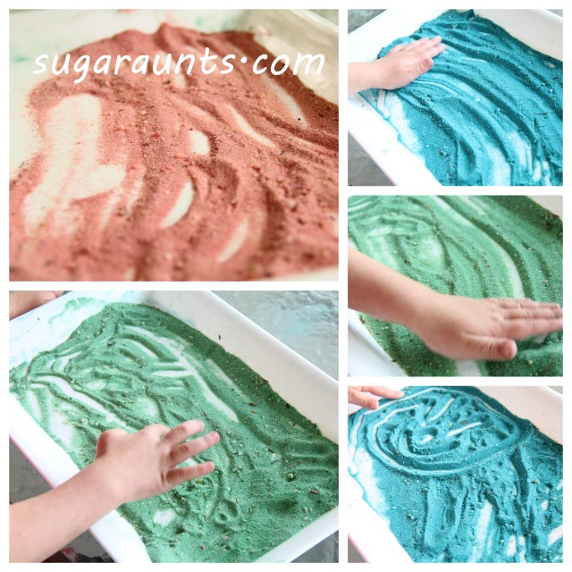 colored sand on tray for child to form letters