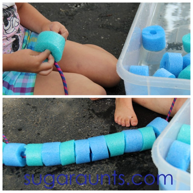 Child threading pool noodles with a jump rope