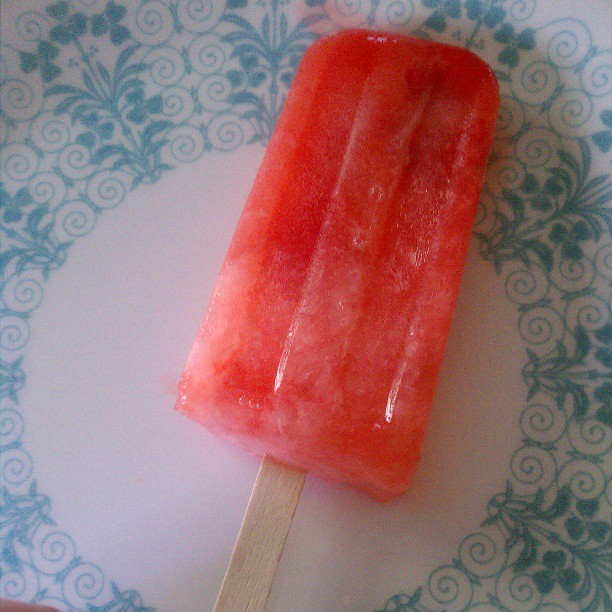 Shirley temple popsicle on a plate