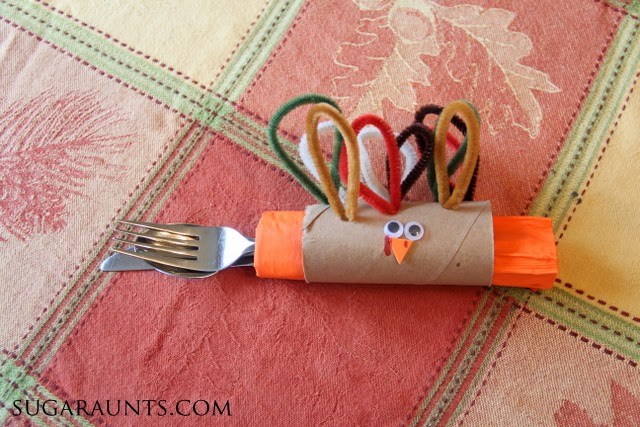 Use this turkey napkin ring craft as the Thanksgiving kids table decorations!
