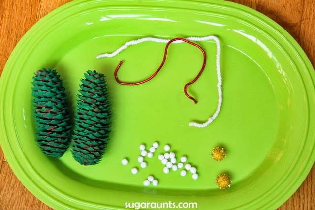 Pine cone Christmas tree craft and ornament. Great for fine motor skills. 
