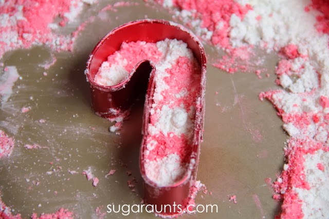 Candy cane moon dough is a sensory material that smells so fresh for holiday family fun. 