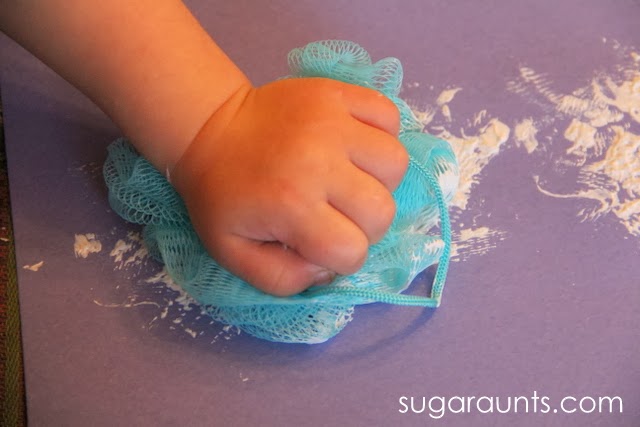 Toddler craft idea using a shower puff to paint.