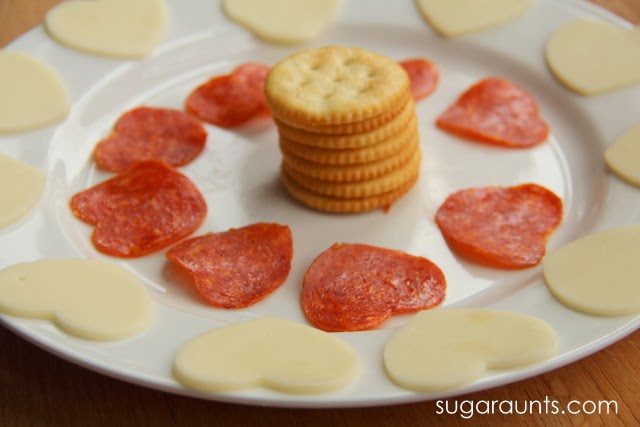 Heart shaped cheese and pepperoni make the perfect non-candy Valentine's day treat for kids.