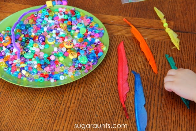 Sorting colored beads to match colored feathers is a fun way to learn colors.