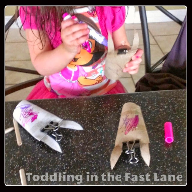 Bunny craft for kids at Easter time, using toilet paper tubes to make an Easter craft while building fine motor skills. 