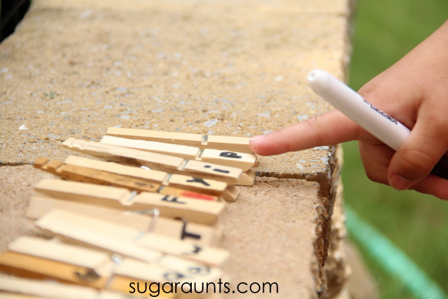 Learning and play with clothes pins in literacy activity. from Sugar Aunts.
