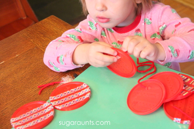 Toddler fine motor activity with lids