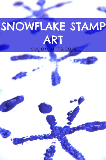 Snowflake stamp art with pipe cleaners and blue paint. This is a great winter craft!