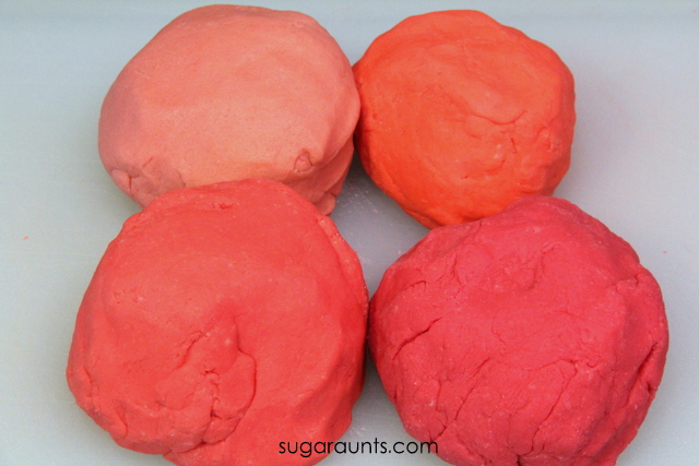 Make a bunch of different shades of red crayon play dough using a pack of crayons!