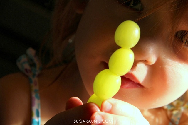 Frozen grapes caterpillar healthy snack for kids.