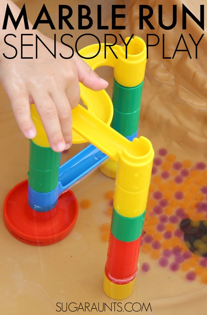 Water table activity for kids: use a marble run and water beads for scooping and pouring fine motor and sensory fun this summer!