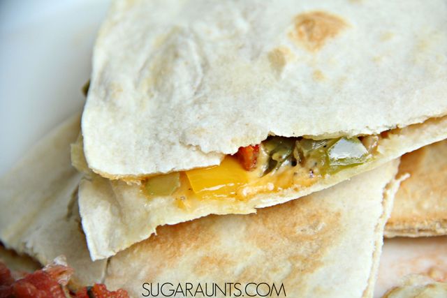 Vegetable Quesadilla Recipe with mushrooms, peppers, onions, and two kinds of cheese, a great dish for kids to eat and make in the kitchen.  Cooking with kids is a great learning opportunity in so many areas!