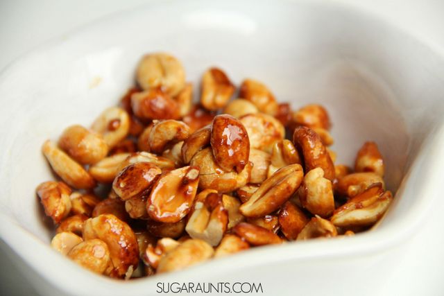 Make honey roasted peanuts with this easy cooking with kids recipe and add this high protein snack to lunches or snack time for kids.