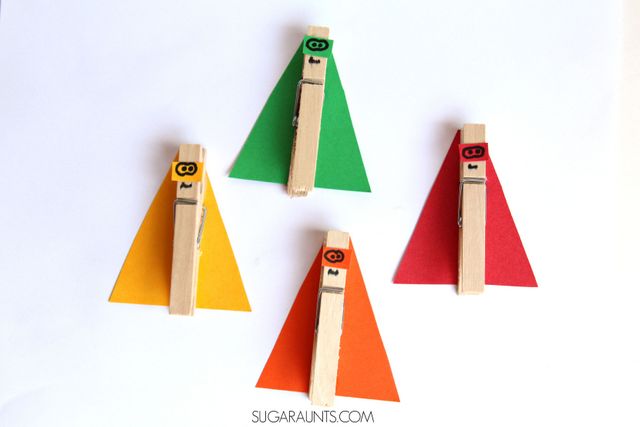 Super hero craft made with clothes pins.