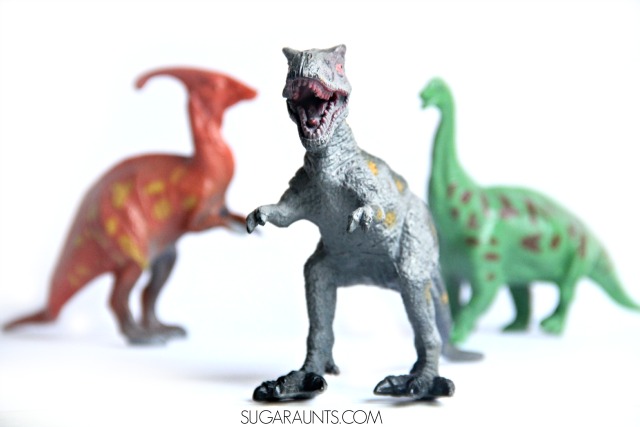 Dinosaur themed sensory (proprioception) heavy work activities for organizing and calming sensory input. This is perfect for a child who seeks out sensory stimulation.