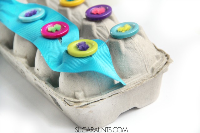 Teach kids how to button with this cute egg carton buttoning activity!  This is fun to make while working on fine motor skills and helping kids with a difficult self-care task.
