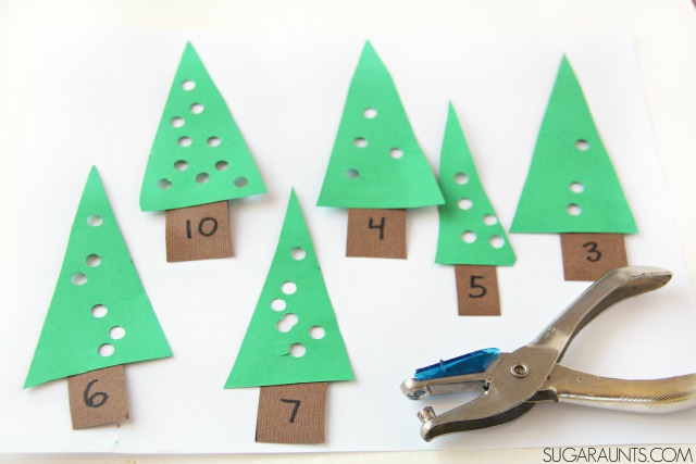Christmas tree hole punch and punching holes each each tree