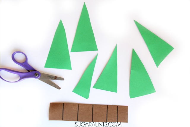Christmas Tree Scissor skills craft for kids this holiday season, perfect for preschool parties or play dates while working on Occupational Therapy goals like cutting on lines. 