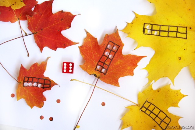 Use those gorgeous fall leaves in a math ten frame activity (with Kindergarten through second graders!) and work on fine motor strengthening and proprioception to the hands, too.  Such a great sensory input activity that is a workout and a fun warm up to handwriting tasks.