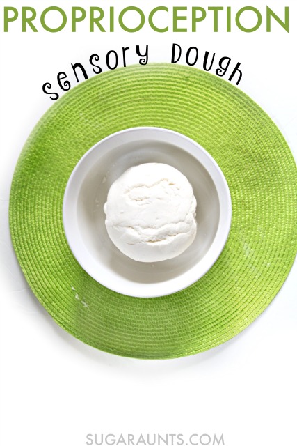 Make this marshmallow fondant dough recipe for a sensory play experience with kids.  The proprioceptive and strengthening input is unbelievable with this resistive and tough dough.  Sensory spectrum kids can get a calming and full body proprioception activity with this dough, from upper extremity to lower extremity for calming and relaxing heavy work.