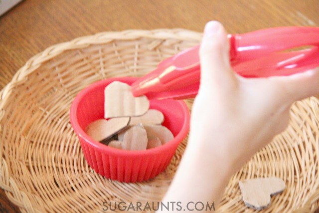 Hand-Eye Coordination Valentines Heart activity for math activities with Kindergarten kids or any school aged child. These jumbo tongs are great for visual motor integration skills and recommended by an Occupational Therapist.
