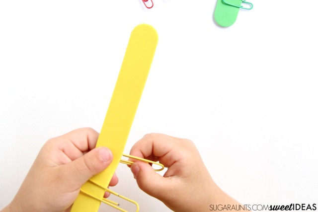 Thumb opposition activity for fine motor skills needed in pencil grasp, buttoning, shoe tying, and zippers.