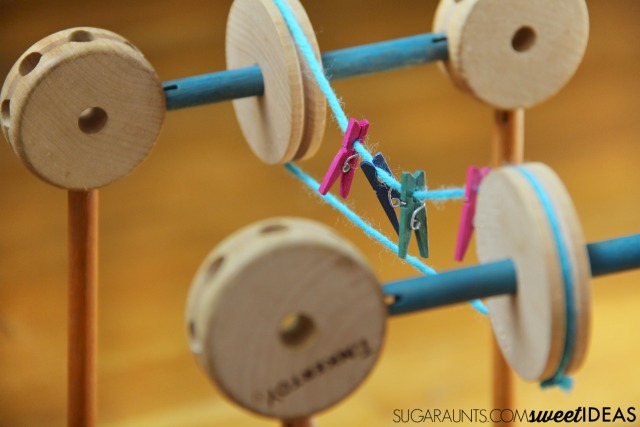 Build a Tinker Toys Pulley system and explore STEM concepts in learning with kids.