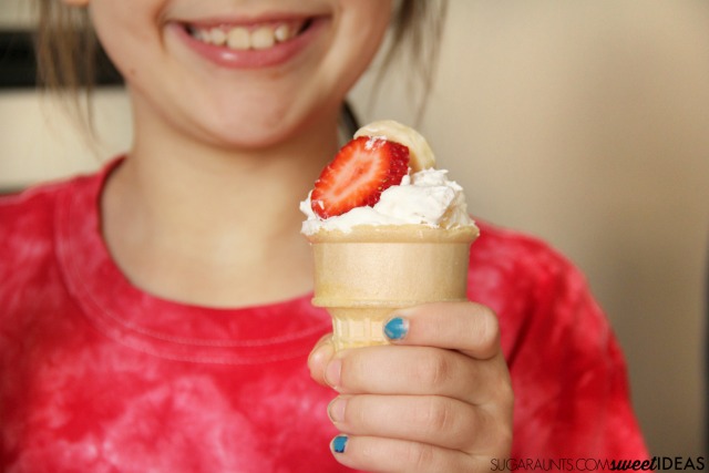 Fruit salad in an ice cream cone snack for kids
