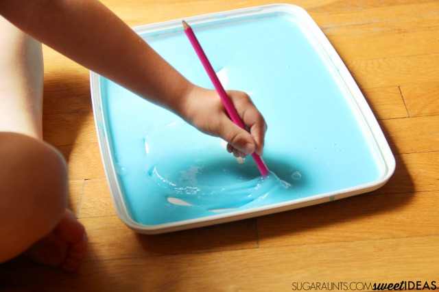 Have you ever wondered how to make slime? This slime recipe is super easy and a great tactile sensory play texture for kids. We used it to work on letter formation and motor control of the pencil with a sensory handwriting writing tray!