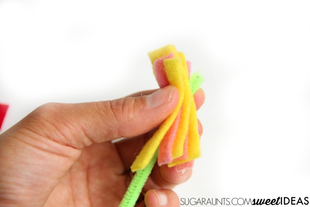 Use felt scraps to make fairy wands for pretend play and imagination activities with kids.