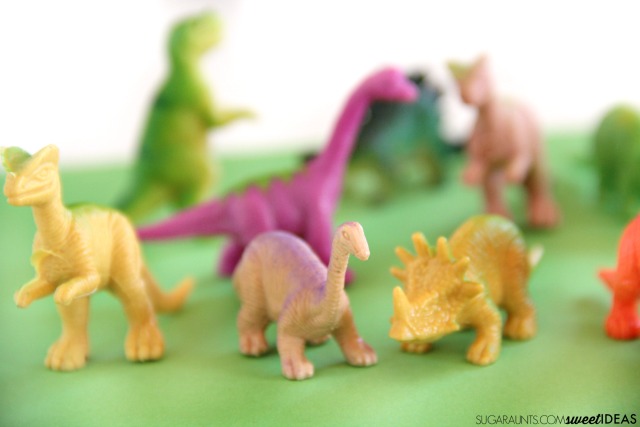 Use plastic dinosaurs in this Goldilocks and the Three DInosaurs jacks game based on Mo Willems childrens book.