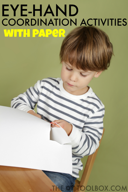Child using paper to work on eye-hand coordination skills.