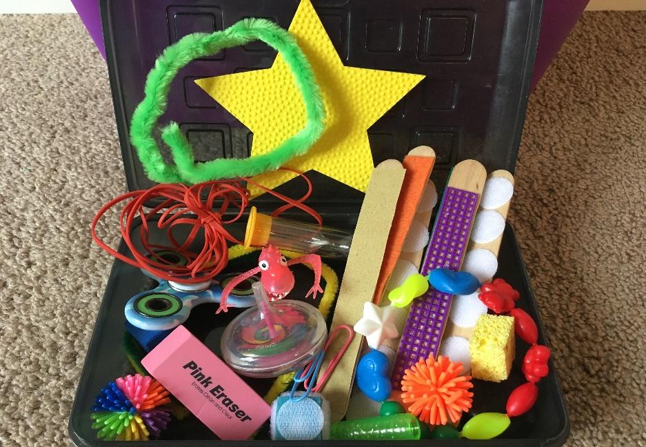 Make an occupational therapy activity toolkit to address attention or self-regulation needs using sensory fidget tools and other items used in pediatric OT.
