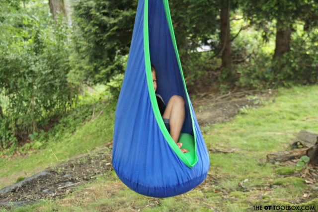 Use a sensory swing outside as part of a sensory diet for calming sensory input.