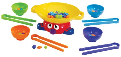 Use the Wok and Roll game to improve pencil grasp, making it the perfect fine motor game for occupational therapy activities.