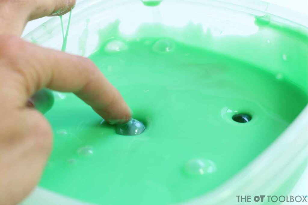 Work on finger isolation and other fine motor skills kids need for pencil grasp, using slime!
